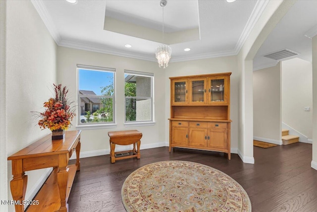 1636 Robb Dr, Carson City, NV 89703 - living area featuring dark wood-style floors, recessed lighting, stairway, a tray ceiling, and ornamental molding