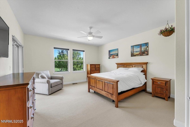 1636 Robb Dr, Carson City, NV 89703 - bedroom with light carpet and a ceiling fan