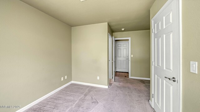 225 Gramercy Ln, Reno, NV 89509 - unfurnished bedroom featuring light carpet and baseboards
