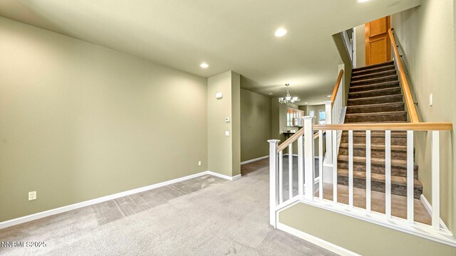 225 Gramercy Ln, Reno, NV 89509 - corridor featuring recessed lighting, stairway, a chandelier, and light colored carpet
