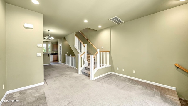 225 Gramercy Ln, Reno, NV 89509 - stairway with carpet, a chandelier, and recessed lighting