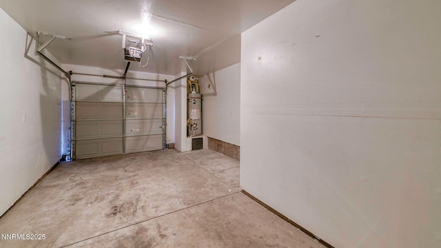 225 Gramercy Ln, Reno, NV 89509 - garage with strapped water heater and a garage door opener