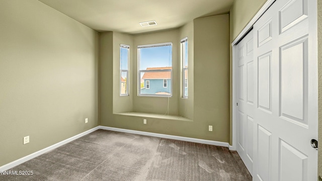 225 Gramercy Ln, Reno, NV 89509 - unfurnished bedroom featuring a closet and carpet