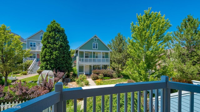 225 Gramercy Ln, Reno, NV 89509 - view of front facade featuring a balcony and stairs