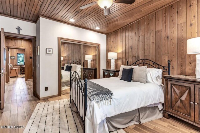 1263 Hidden Woods Dr, Zephyr Cove, NV 89413 - bedroom featuring wood ceiling, wooden walls, light wood-type flooring, a ceiling fan, and recessed lighting