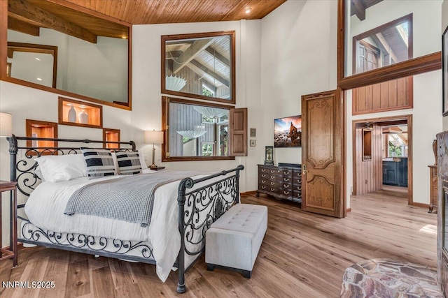 1263 Hidden Woods Dr, Zephyr Cove, NV 89413 - bedroom with high vaulted ceiling, wooden ceiling, and wood finished floors