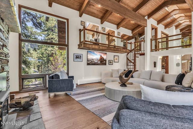 1263 Hidden Woods Dr, Zephyr Cove, NV 89413 - living room featuring a wooden ceiling with exposed beams, wood finished floors, high vaulted ceiling, and stairway