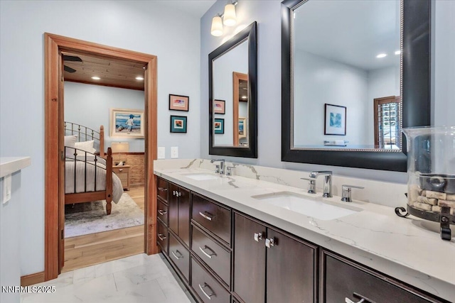 1263 Hidden Woods Dr, Zephyr Cove, NV 89413 - full bath with marble finish floors, double vanity, ensuite bathroom, and recessed lighting