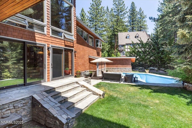 1263 Hidden Woods Dr, Zephyr Cove, NV 89413 - view of grassy yard featuring a patio area and an outdoor pool