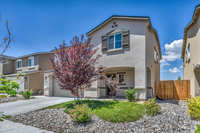 8977 Sagemoor Dr, Reno, NV 89506 - view of front of home featuring stucco siding and concrete driveway