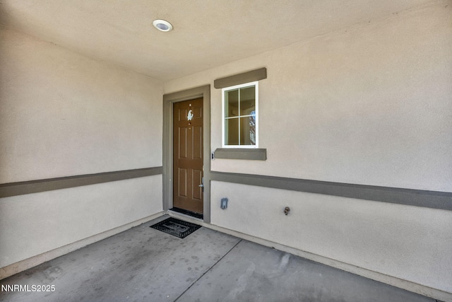 8977 Sagemoor Dr, Reno, NV 89506 - property entrance with stucco siding