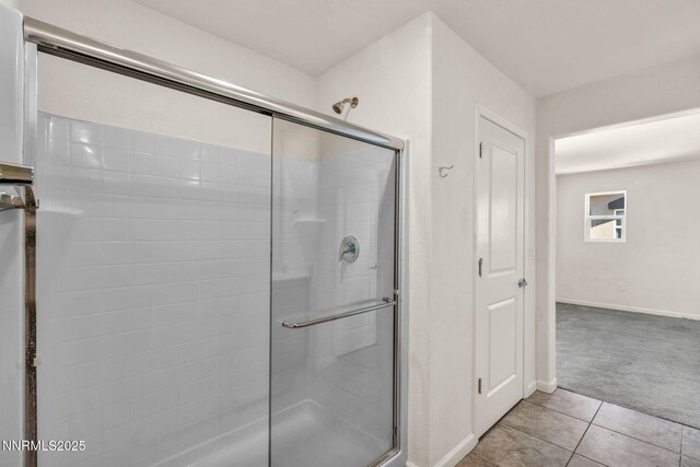 8977 Sagemoor Dr, Reno, NV 89506 - bathroom with a stall shower and tile patterned floors