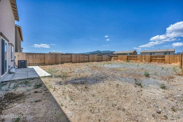 8977 Sagemoor Dr, Reno, NV 89506 - fenced backyard featuring a patio area