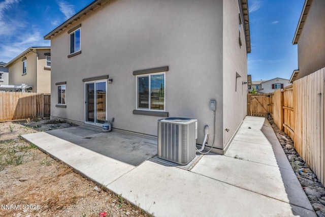 8977 Sagemoor Dr, Reno, NV 89506 - rear view of property featuring a patio, stucco siding, and a fenced backyard