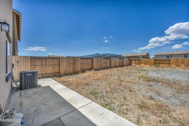 8977 Sagemoor Dr, Reno, NV 89506 - fenced backyard with a patio area