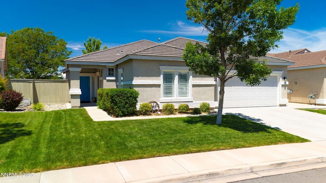 1575 Canyonlands Ct, Reno, NV 89521 - ranch-style home with concrete driveway, stucco siding, a tile roof, and an attached garage