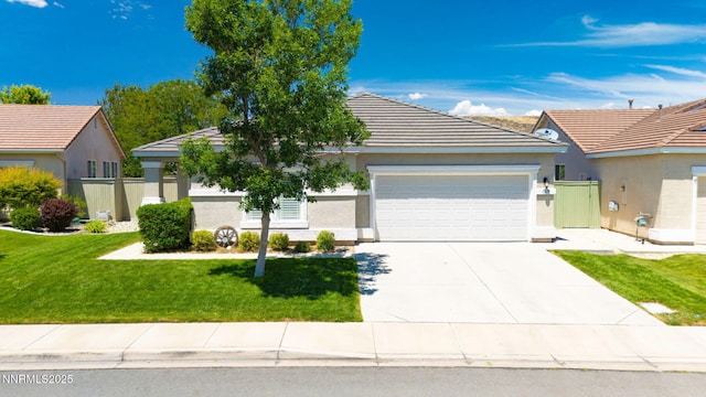 1575 Canyonlands Ct, Reno, NV 89521 - view of front of property with a garage, concrete driveway, a front yard, stucco siding, and a tile roof