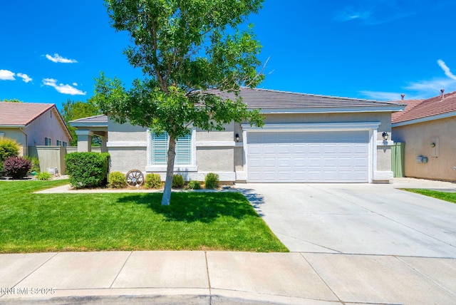 1575 Canyonlands Ct, Reno, NV 89521 - view of front of home featuring a garage, driveway, stucco siding, a front lawn, and a tile roof