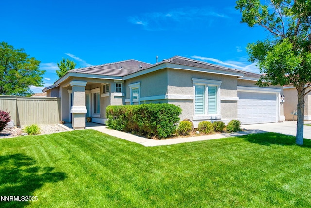 1575 Canyonlands Ct, Reno, NV 89521 - view of front of property with stucco siding, concrete driveway, an attached garage, and a tile roof