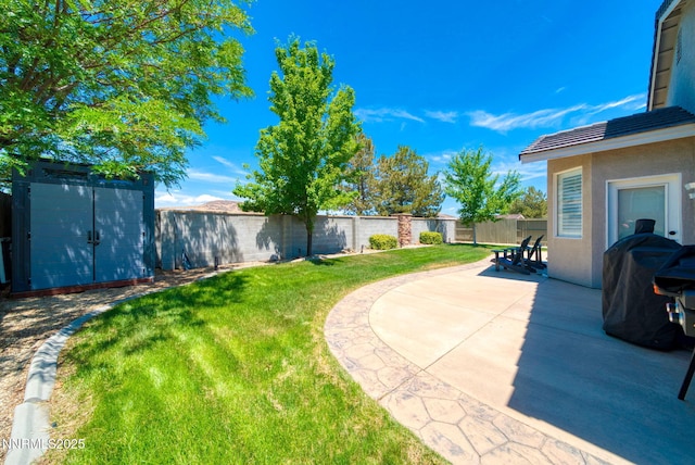 1575 Canyonlands Ct, Reno, NV 89521 - fenced backyard with a storage unit and a patio area