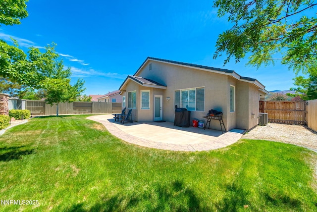 1575 Canyonlands Ct, Reno, NV 89521 - back of house featuring stucco siding, a patio, and a fenced backyard