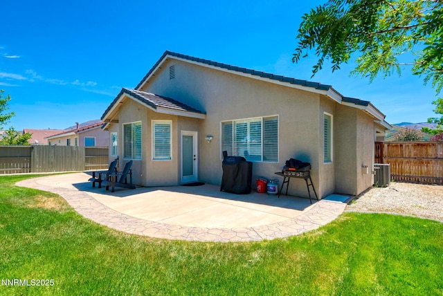 1575 Canyonlands Ct, Reno, NV 89521 - back of house with stucco siding, a fenced backyard, and a patio area