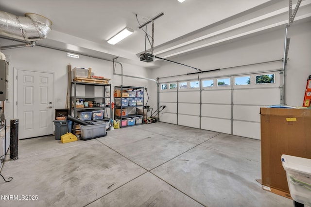 6161 Wycliffe Cir, Reno, NV 89519 - garage featuring a garage door opener