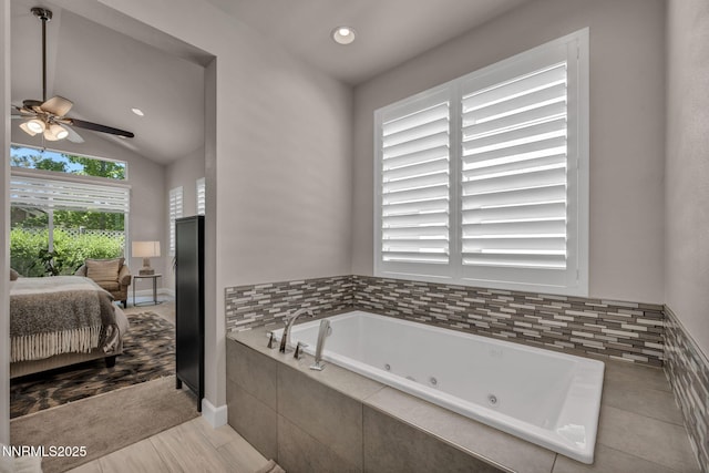 6161 Wycliffe Cir, Reno, NV 89519 - ensuite bathroom with a tub with jets, a ceiling fan, vaulted ceiling, recessed lighting, and tile patterned floors
