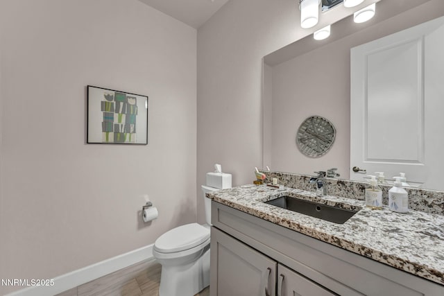 6161 Wycliffe Cir, Reno, NV 89519 - half bathroom with vanity and wood finished floors
