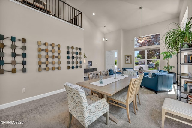 6161 Wycliffe Cir, Reno, NV 89519 - dining area with carpet, a high ceiling, and recessed lighting