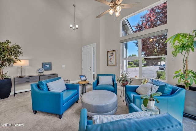 6161 Wycliffe Cir, Reno, NV 89519 - living area with carpet floors, a towering ceiling, and ceiling fan