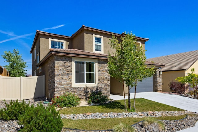 14144 American Pillar Ct, Reno, NV 89511 - view of front facade featuring stone siding, driveway, stucco siding, a tile roof, and an attached garage