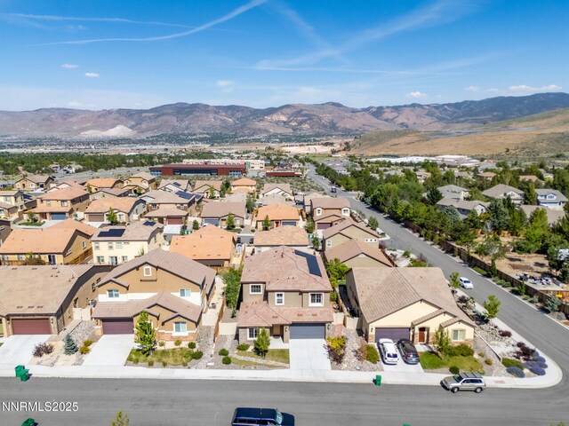 14144 American Pillar Ct, Reno, NV 89511 - aerial perspective of suburban area with a mountain backdrop