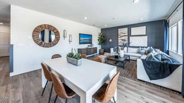 7602 Apex Pl # 106, Reno, NV 89506 - dining room with recessed lighting, light wood-style flooring, and an accent wall