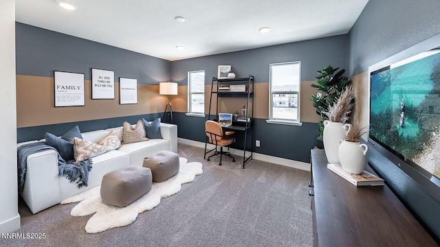 7602 Apex Pl # 106, Reno, NV 89506 - carpeted living area with an office area and baseboards
