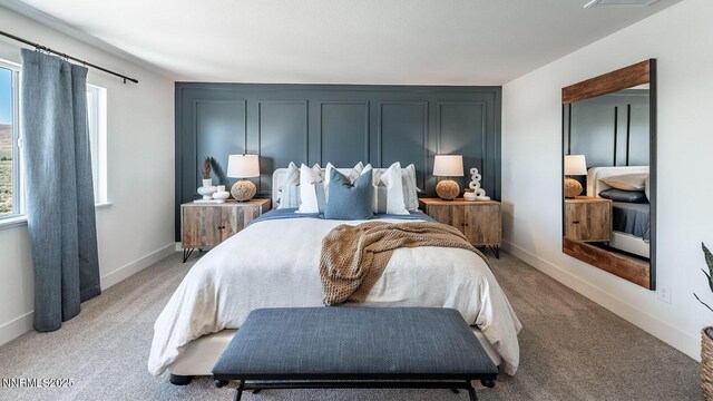7602 Apex Pl # 106, Reno, NV 89506 - bedroom featuring multiple windows and light carpet