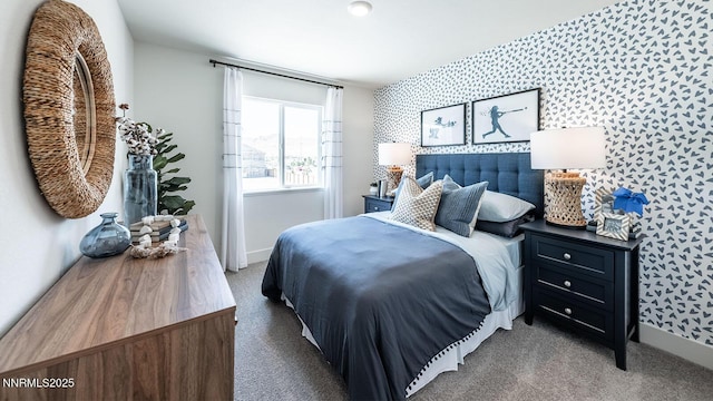 7602 Apex Pl # 106, Reno, NV 89506 - bedroom with wallpapered walls, carpet, and an accent wall