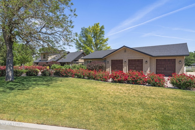 10594 Dixon Ln, Reno, NV 89511 - view of front facade with a front lawn and an attached garage