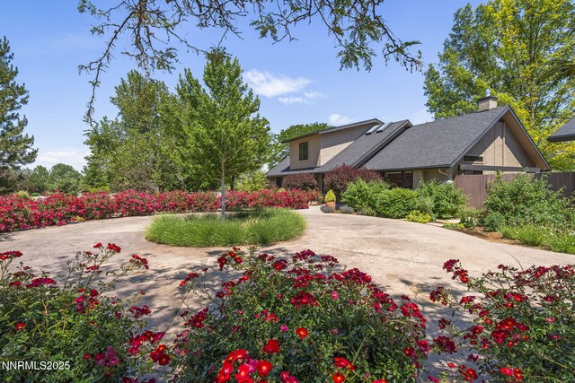 10594 Dixon Ln, Reno, NV 89511 - exterior space with curved driveway