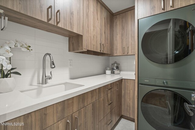 10594 Dixon Ln, Reno, NV 89511 - washroom with estacked washer and dryer and cabinet space