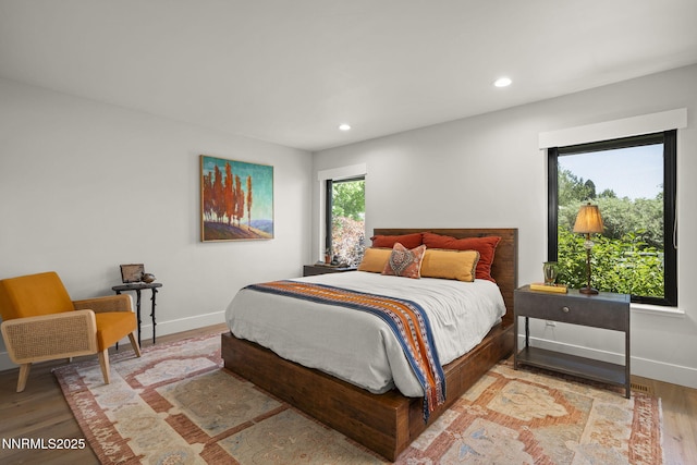 10594 Dixon Ln, Reno, NV 89511 - bedroom with recessed lighting and wood finished floors