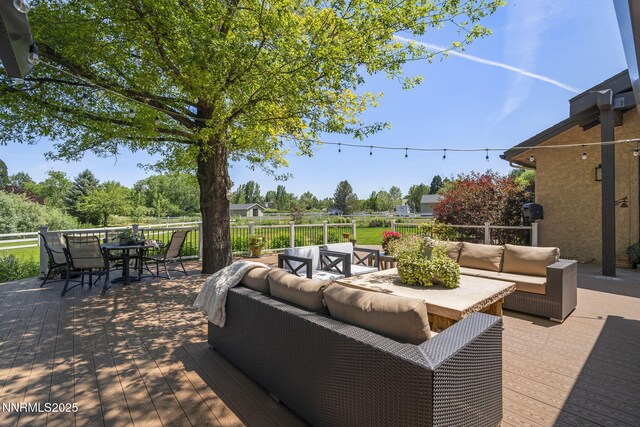 10594 Dixon Ln, Reno, NV 89511 - view of patio / terrace featuring an outdoor living space, outdoor dining space, and a wooden deck
