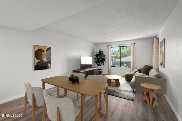 3095 Lakeside Unit 203, Reno, NV 89509 - living area featuring light wood-type flooring and a textured ceiling