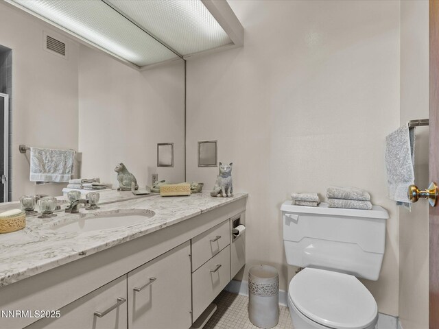 100 N Arlington Ave Unit 20J, Reno, NV 89501 - bathroom featuring vanity and tile patterned flooring