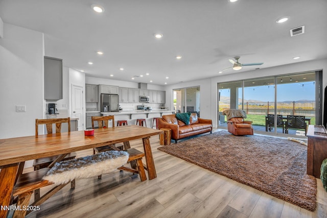 1250 Hubble Ln, Carson City, NV 89705 - dining space with a ceiling fan, light wood finished floors, and recessed lighting