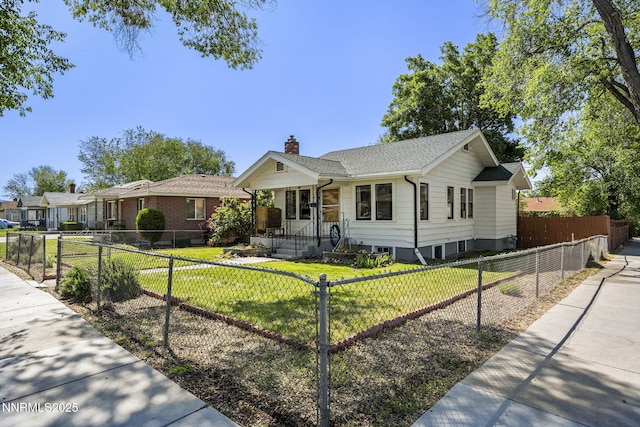 704 Roberts St, Reno, NV 89502 - single story home with a chimney and a fenced front yard