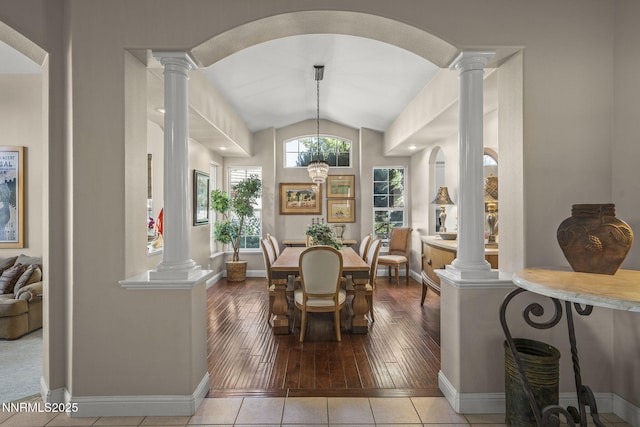 4374 Cullen Ct, Reno, NV 89519 - dining space with ornate columns, lofted ceiling, and hardwood / wood-style floors
