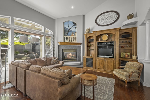 4374 Cullen Ct, Reno, NV 89519 - living room with a premium fireplace, hardwood / wood-style floors, ornate columns, and recessed lighting