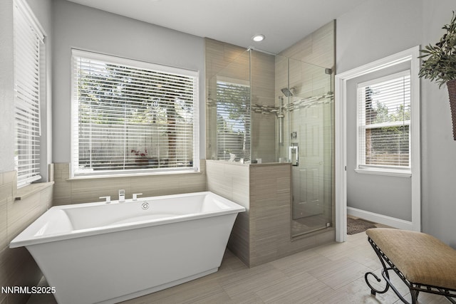 4374 Cullen Ct, Reno, NV 89519 - bathroom with a freestanding bath, a shower stall, and healthy amount of natural light
