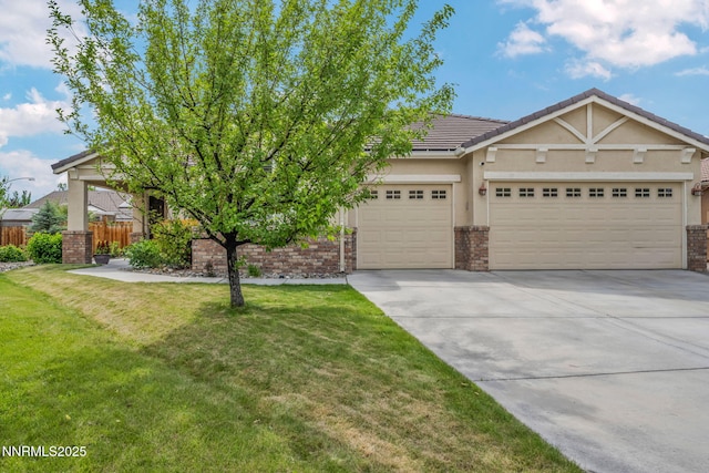 6469 Hale Bopp Ct, Sparks, NV 89436 - view of front of property featuring concrete driveway, an attached garage, stucco siding, and brick siding
